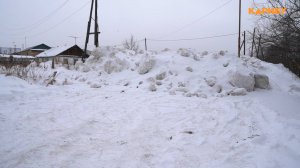 На снежный завал вместо дороги жалуются жители Колымского шоссе