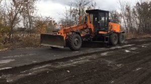 Самарцы провели планировку дороги  в Снежном