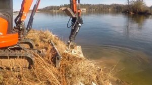 Demolition of 500' concrete seawall on Lake Harding.