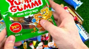 a Lot of Candy Unboxing Skittles, Twix, Skittles, KitKat, Lollipops And Many Other Chocolate Candy