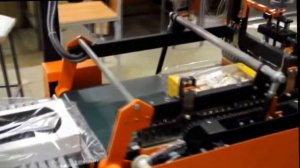 Видео ТМ-2А Упаковка кондитерских изделий в ПОФ пленку.