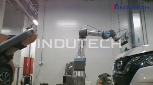 Тестирование ресурса дверных петель на автомобиле с помощью коллаборативных роботов