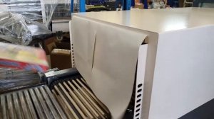 Упаковка картонных коробок в термоусадочную плёнку. Термоупаковочная машина ТМ-2А. ДЭНКАР.