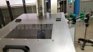 Автоматическая линия розлива нашатырного спирта в пластиковые бутылки объемом 1л.