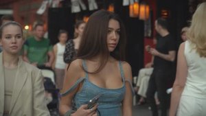 4K. Amazingly stylishly dressed people walk down the street.