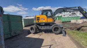 Колесный экскаватор XINYUAN B70S в работе, отзыв клиента