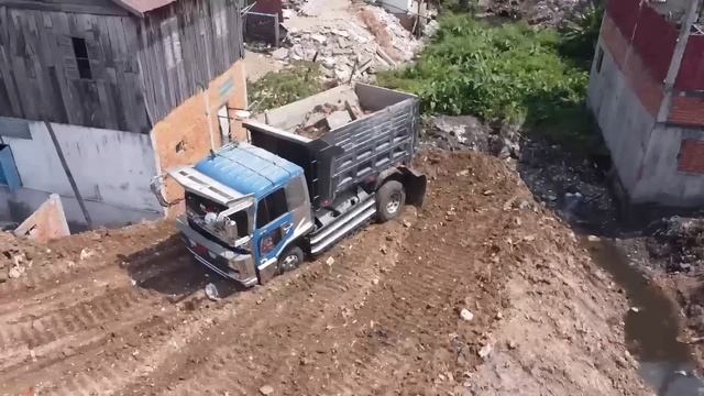 Строительство, засыпка мусора