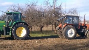 Битва тракторов – MTZ Беларус 1221 vs John Deere 6820, кто кого