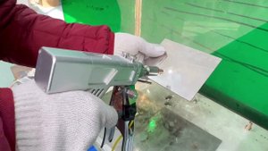 Setting the focal length on the laser welding gun Настройка фокусного расстояния на пистолете сварк