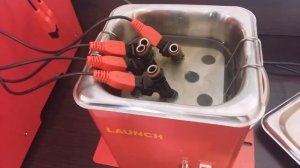 обзор работы стенда для промывки форсунок launch