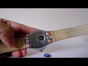 How to replace battery and strap pim in a Swatch irony watch