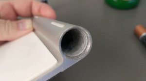 How to fix stuck Apple Magic Trackpad (A1339) battery screw door and battery corrosion.