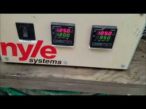 Finishing last step in kiln drying process. Steaming lumber to remove case hardening.