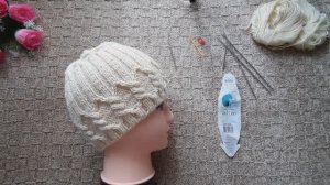 ШАПКА  теплая с косами ..