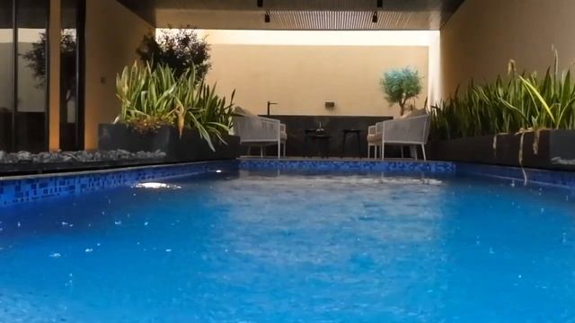 Sleep Soundly Tonight: Soothing Raindrops on Pool for Instant Relaxation