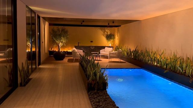 Indulge in Nighttime Serenity: Luxurious Poolside Relaxation in 4K at a Modern Mansion