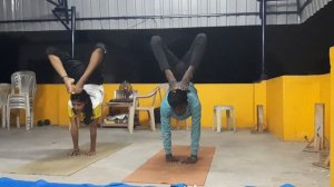 EsAn Yoga Scorpion  yogi and yogini