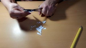 Снежинка из листа бумаги.