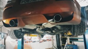 выхлопная система на Nissan 350Z с резонатором Гельмгольца и электронным управлением уровня звука