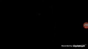 негыр смеётся в темноте