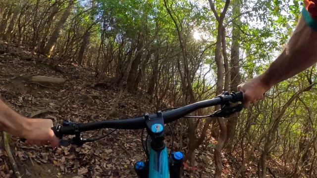 Take it easy on the rental bike, lady!! Mountain Biking Black Mountain in Pisgah