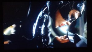 Catwoman kisses Batman