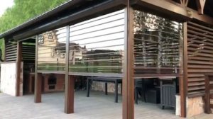 Прозрачные рольставни для загородной веранды.