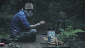 BRUCKE. The Staircase Railing and a Small Wood Stove