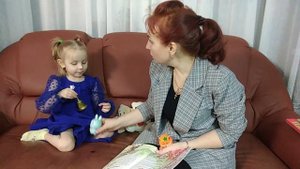 "Мама читает на коми языке"