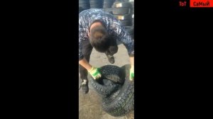 на заводе автомобильный покрышек, упаковка шин