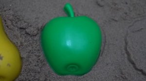 We play in the sandbox with beach toys and make sand figures