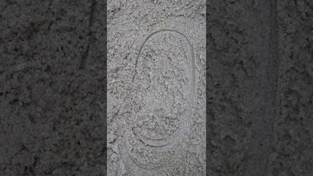 We play in the sandbox with beach toys and sing a song