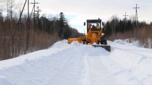 Работа Автогрейдера СДМ-25 с путепрокладочным оборудованием с боковым отвалом