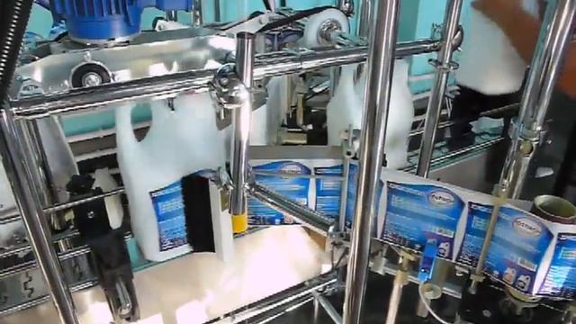Двухпозиционный этикетировщик на плоскую тару (канистру)