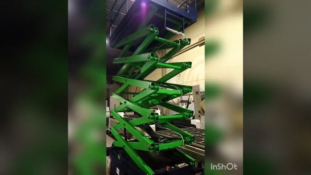 Самоходный ножничный подъемник на 500 кг и на высоту 12 метров HTLIFTERS