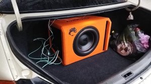 Установка активного сабвуфера DL Audio Piranha 12A Orange V.2  в KIA Spectra