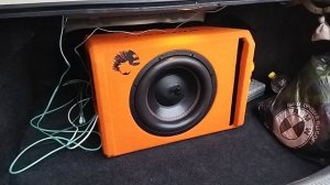 Установка активного сабвуфера DL Audio Piranha 12A Orange V.2 в KIA Spectra