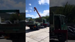 Крановая установка вместе с самосвальным кузовом