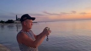 ЕйскЗакусали комары на юге. Город завалило мусором, а Москву снегом. Закат на Ейской косе.