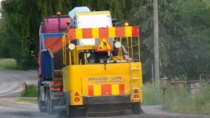 Scania R560 Pulls A BRODD-SON Sweeping Machine