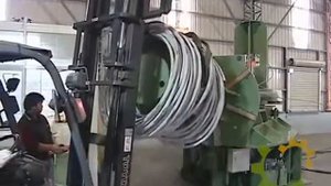 Размотчики катанки и механизм для отгибания конца катанки