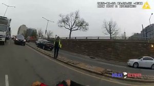 DC Officer Shoots Man Jumping Out of Ambulance and Charging at The Officer With a Metal Object