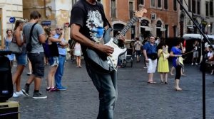 Pink Floyd - Time 
Уличный музыкант в Риме