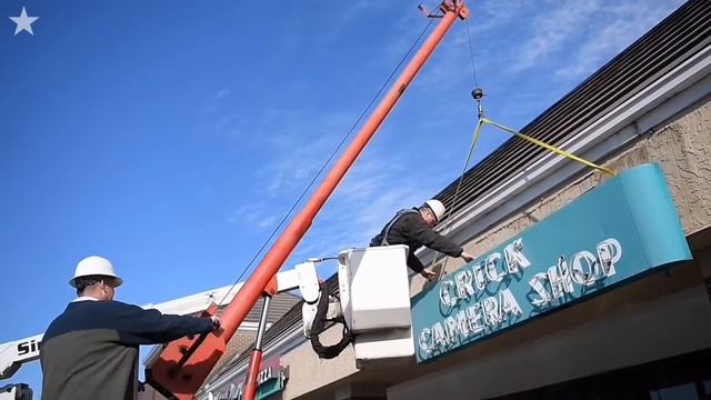 1946 Crick Camera Shop neon sign saved after closing