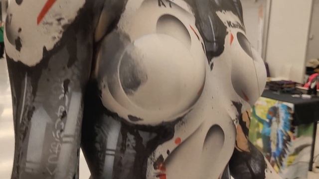 Beautiful model wears BODY PAINTING at a public event