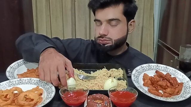 Pakistani food Mukbang ASMR spicy noodles with zinger chips, onion rings and chicken pakora