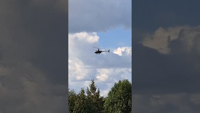 The helicopter takes off into the sky