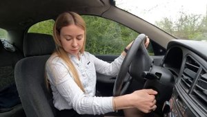 Blonde cranking old Daewoo Lanos