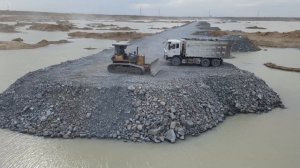 Строительство, дорога через озеро