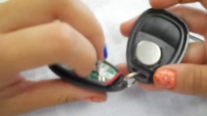 How To Replace A 2007 - 2014 Chevrolet Tahoe Key Fob Battery FCC ID OUC60270